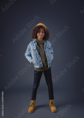 Lovely stylish teenage girl in denim jacket