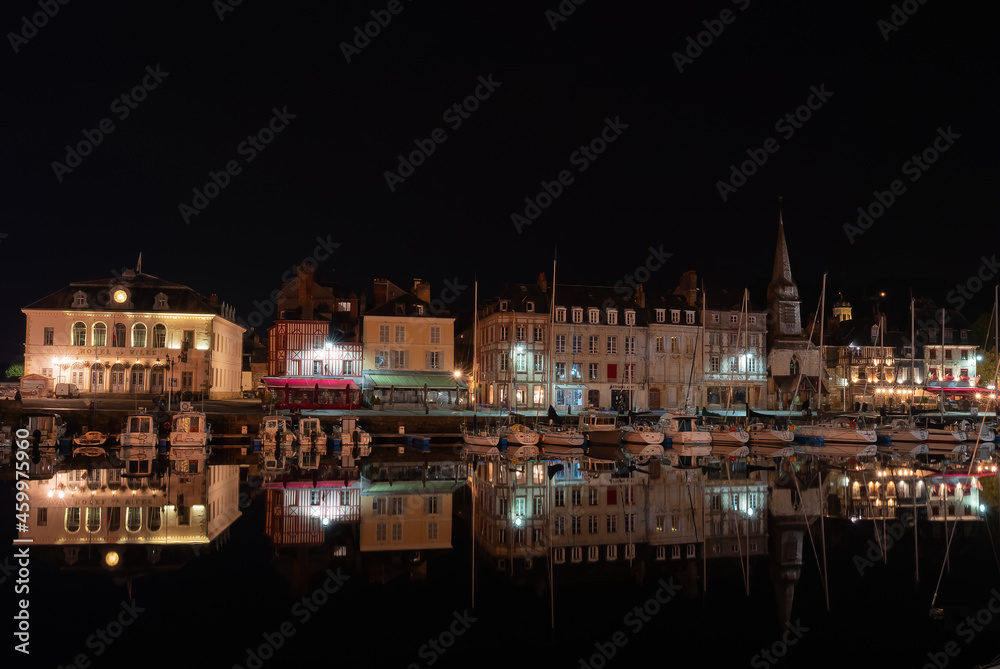 Honfleur at night, a french commune in the Calvados department and famous tourist resort in Normandy. Especially known for its old port.