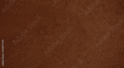 grunge dark brown gradient stucco wall background.