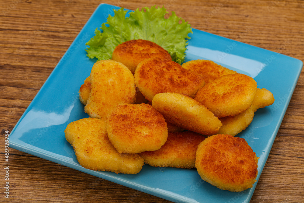 Fried chicken nuggets served salad leaves Fried chicken nuggets served salad leaves