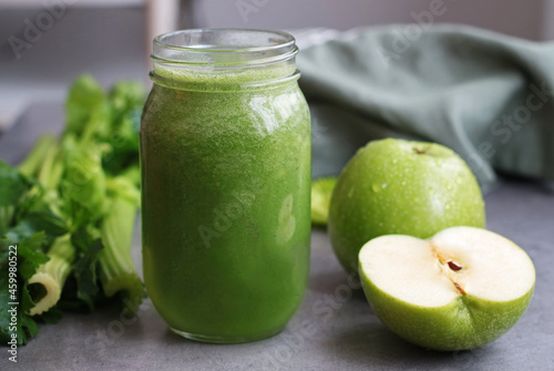 A glass of healthy celery juice with green apple, a green vegetables healthy drink for detox. It’s well known as powerful medical healing remedy 