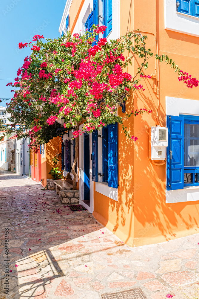 Colorful house on the island of Halki, part of the Dodecanese island chain, Greece
