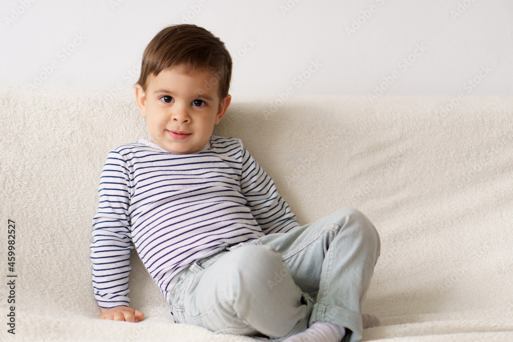 Happy mixed race Asian Persian appearance baby boy laughing while playing with plastic blocks toy at home or nursery room.little child having fun learning and play fine motor development Happy mixed race Asian Persian appearance baby boy laughing while playing with plastic blocks toy at home or nursery room.little child having fun learning and play fine motor development