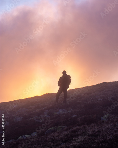 A photographer in sunset in Low Tatras mountains national park, Slovakia