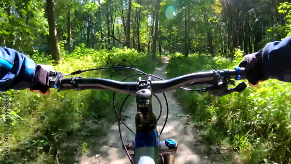 Amateur rider on the MTB bicycle on the trails in the autumn season Amateur rider on the MTB bicycle on the trails in the autumn season
