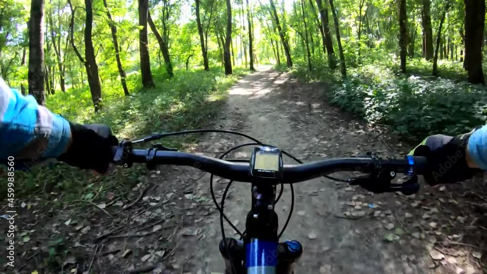 Amateur rider on the MTB bicycle on the trails in the autumn season Amateur rider on the MTB bicycle on the trails in the autumn season