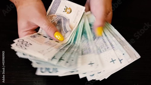 The woman counts the money. Close up of female hands count money cash. Money, Payment, Finance, Investment and Success, Concept. Currency exchange in banking institution
