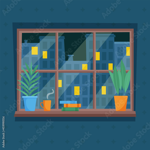 Night view of city from window. Lights in windows.