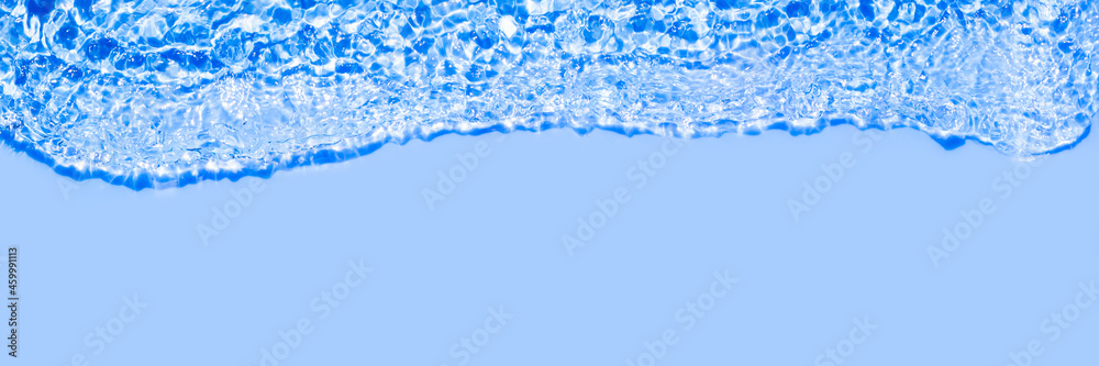 Serum texture close up. Clear blue liquid gel background. Transparent beauty skincare product sample. Cosmetic clear liquid cream smudge. Transparent skin care long banner with copy space Serum texture close up. Clear blue liquid gel background. Transparent beauty skincare product sample. Cosmetic clear liquid cream smudge. Transparent skin care long banner with copy space