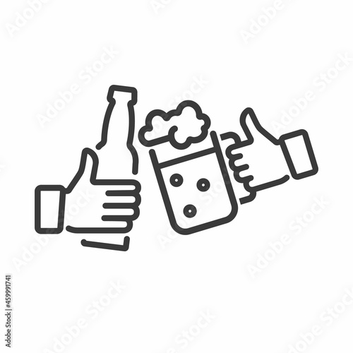 Two hands holding the beer bottle and beer mug.