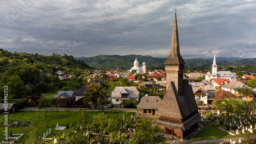 Aerial view of wooden churches from Maramures national park in Romania