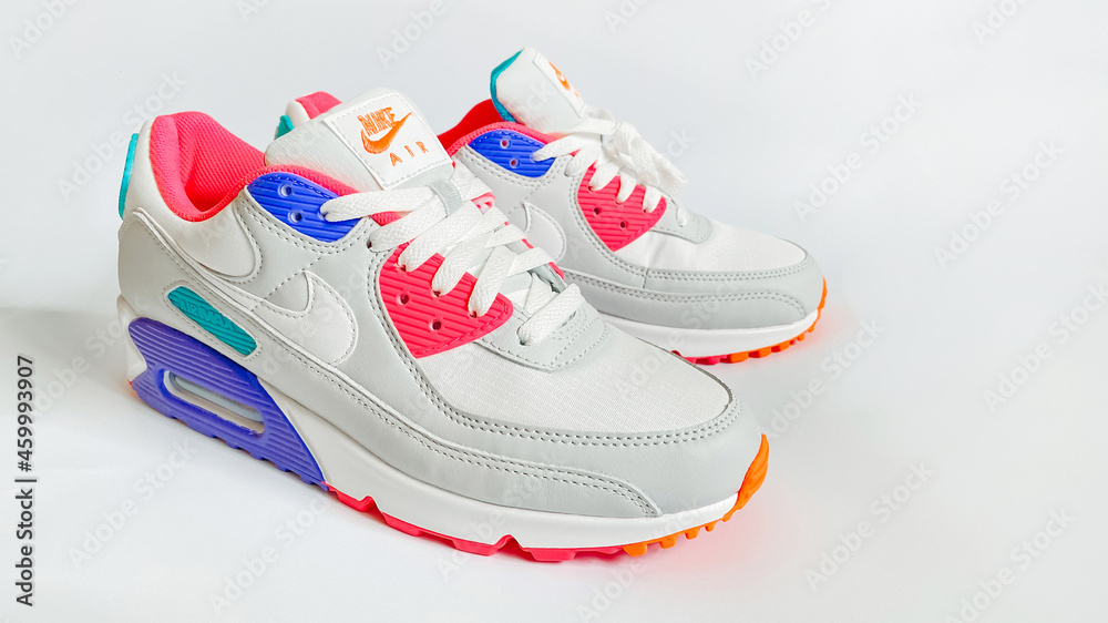 nood Verwacht het Discriminerend The famous Nike Air Max 90 sneakers on a white background. Iconic shoe with  waffle sole, stitched overlays and classic thermoplastic accents and  beautiful juicy colors. Stock Photo | Adobe Stock