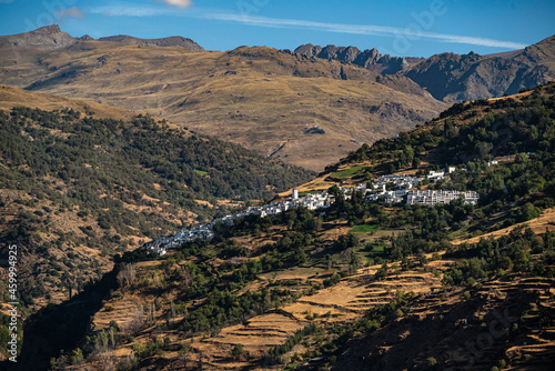 Scenic view of the beautiful Poqueira valley  with the village of Capileira in the distance  Las Alpujarras  Sierra Nevada National Park  Andalusia  Spain