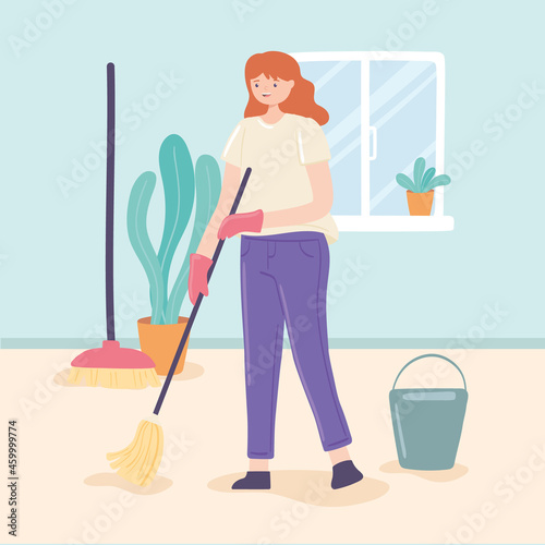woman mopping at home
