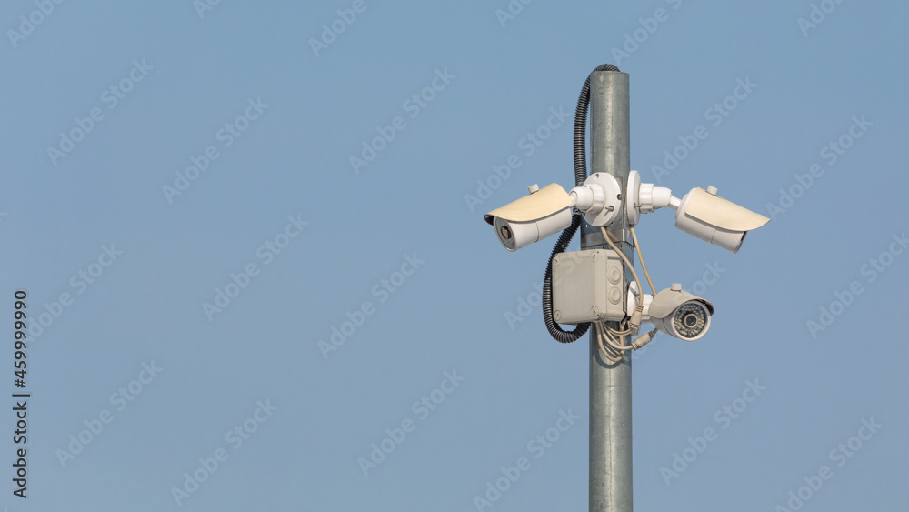Swivel high quality CCTV camera on sky background. Swivel high quality CCTV camera on sky background.