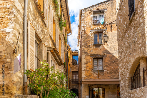 Picturesque stone medieval homes and apartments inside the walled village of Tourrettes-Sur-Loup in the Provence  Alpes-Maritimes region of southern France.
