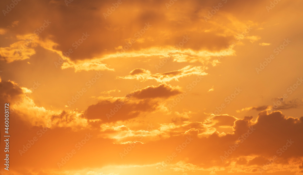 Beautiful golden dark sunset sky with clouds. Sky after sunset background.  Stock Photo | Adobe Stock