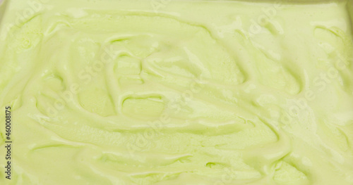 Texture ice cream lime sherbet Melted Surface, Front view Food concept, Blank for design. photo