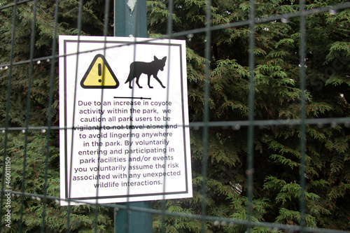 View of sign Coyotes in Stanley Park following attacks by animals on trails within the park in Vancouver photo