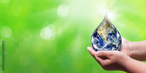 The world environment day, Earth globe on hands, Green planet with copy space. Elements of this image furnished by NASA .