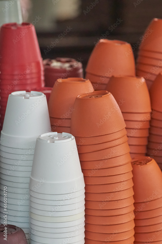 A lot of the plastic pots in the gardening shop A lot of the plastic pots in the gardening shop