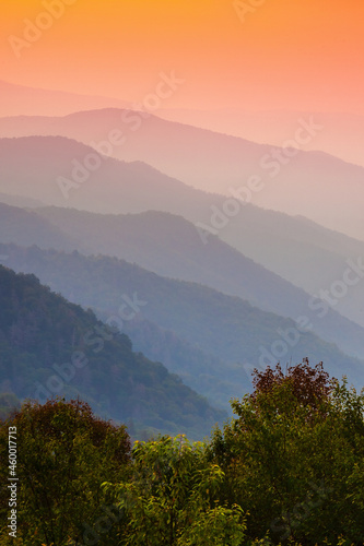 Morning breaks over the mist shrouded hills of the Oconaluftee Overlook in the Great Smoky Mountains National Park