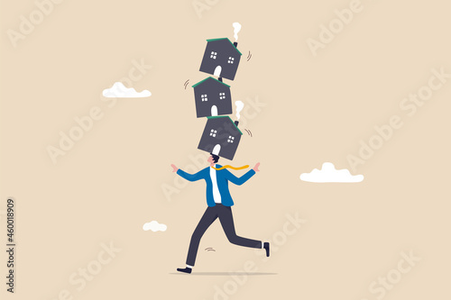 Housing investment risk, uncertainty of property mortgage loan and interest rate, real estate debt, buying too many houses concept, tried businessman balancing unstable stack of houses he bought.