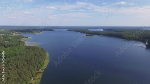 Wallpaper Mural Baltieji Lakajai Lake in Lithuania. Aerial Tracking Left Shot Torontodigital.ca