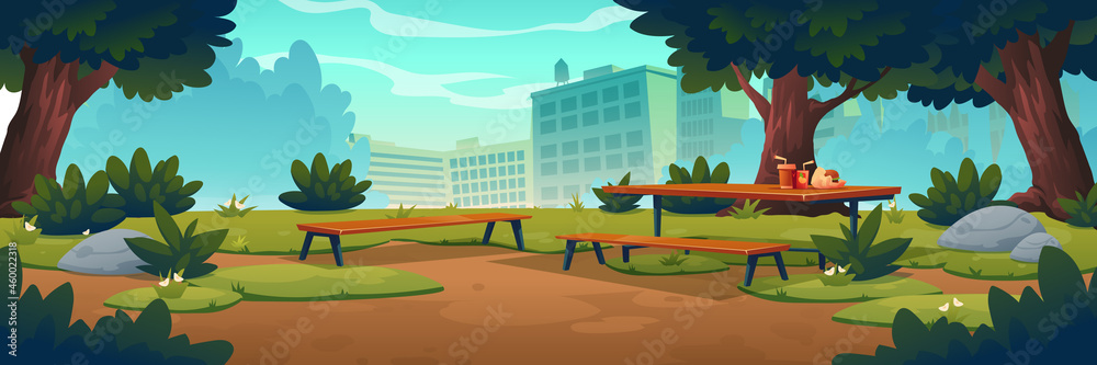 City park with wooden picnic table and benches, green trees, grass with flowers and town buildings on skyline. Vector cartoon summer landscape of empty public garden with food and drink on table - obrazy, fototapety, plakaty 