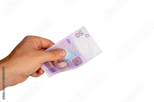 Hand holds money on a white background