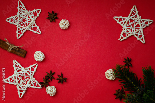 Red Christmas background with Christmas decoration, space to write your text.