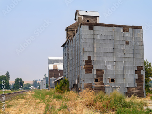 The damaged metal siding on a grain elevator in southeastern Washington, USA