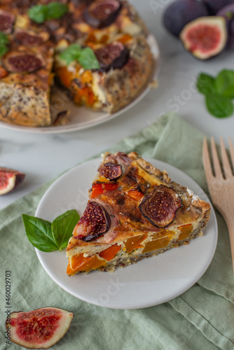 home made autumn quiche with pumpkin and figs