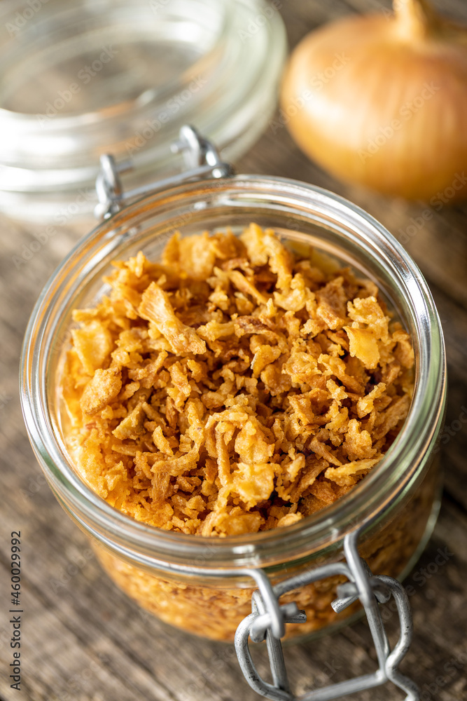 Pieces of fried onions in jar.