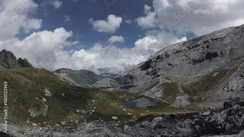 Wallpaper Mural Timelapse of clouds and shadows over a beautiful valley with talus rocks and lakes. Torontodigital.ca