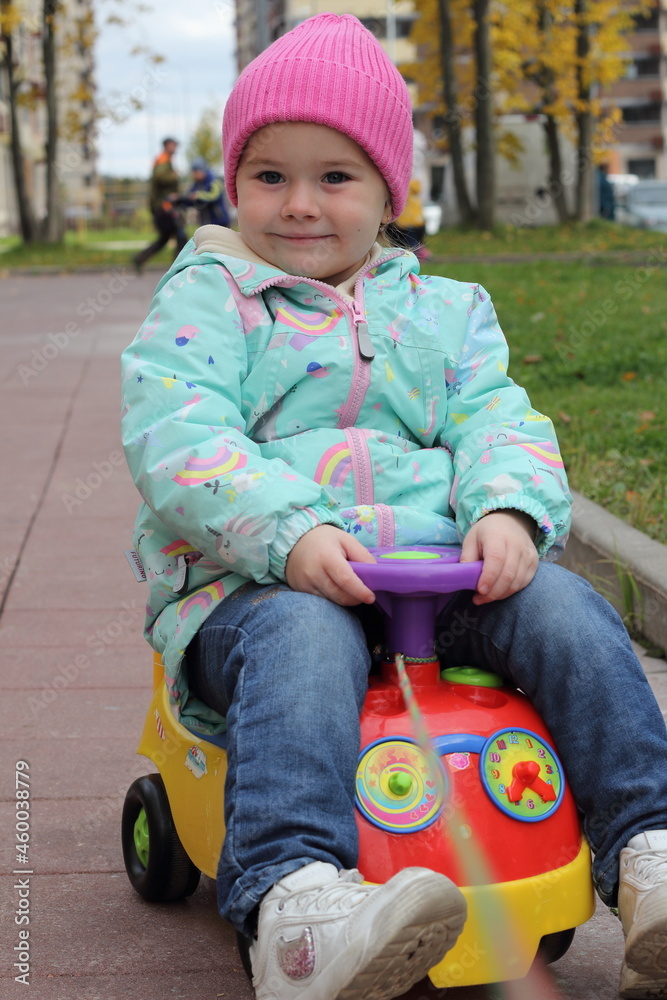 little child playing with toys