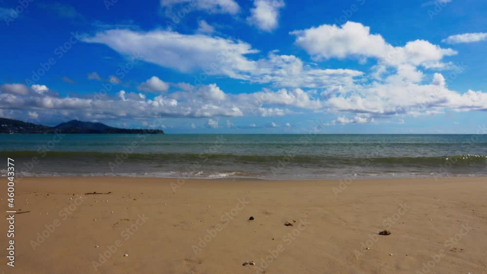 View of tropical beach.
Peaceful and beautiful beach in sunny day of phuket island with cloud blue sky,4K video.
 