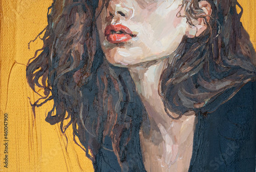 Portrait of a girl on a gold background. Portrait of a young beautiful women with red lips. Fragment of oil painting on canvas.