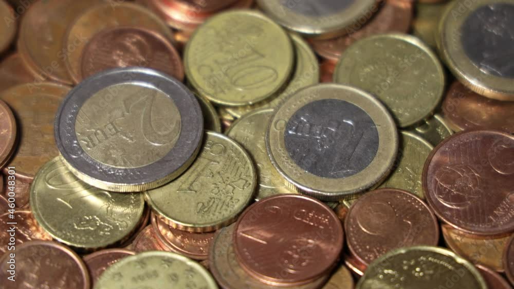 Rotating pile of Euro coins as background. Perspective Rotating pile of Euro coins as background. Perspective
