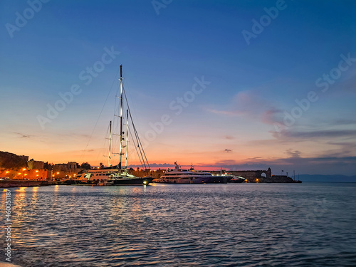 Boats in the port of Rhodes at night.