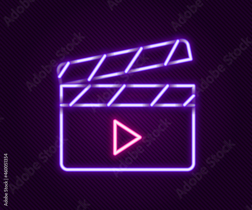 Glowing neon line Movie clapper icon isolated on black background. Film clapper board. Clapperboard sign. Cinema production or media industry. Colorful outline concept. Vector