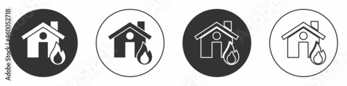 Black Fire in burning house icon isolated on white background. Circle button. Vector