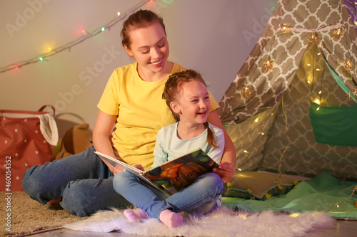 Young woman reading fairy-t...