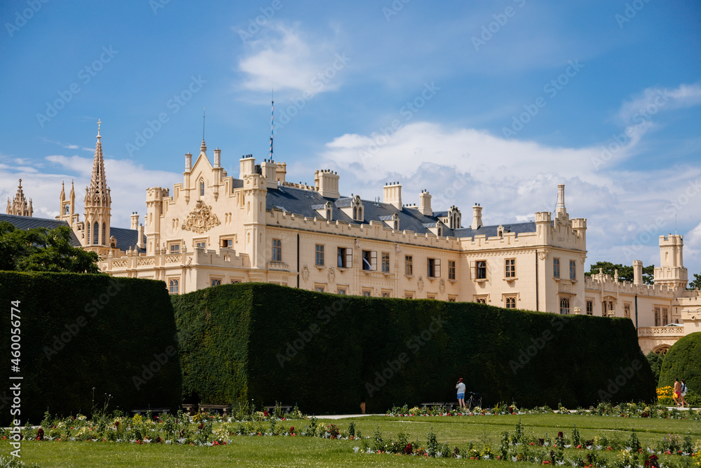 Lednice, Southern Moravia, Czech Republic, 04 July 2021: chateau with beautiful gardens, flower parks on sunny summer day, neo-gothic romantic castle, UNESCO World Heritage, Lednice Valtice Landscape