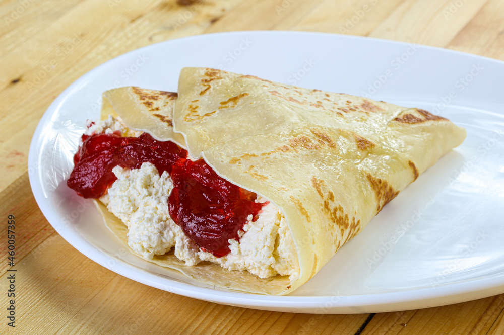 Pancake with cottage cheese and jam