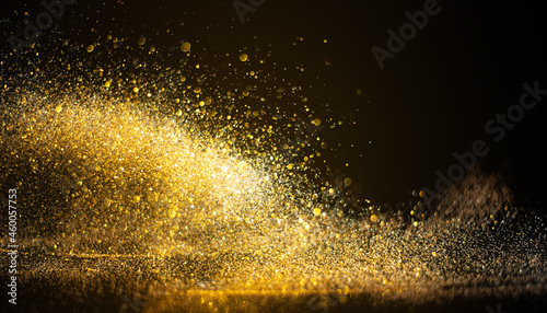blurred glitter bombs, gold glitter defocused abstract Twinkly Lights grunge Background.