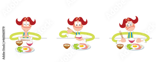 箸で食事をする女の子