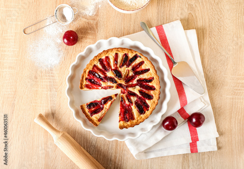 Baking dish with tasty plum...