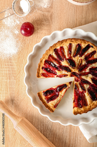 Baking dish with tasty plum...