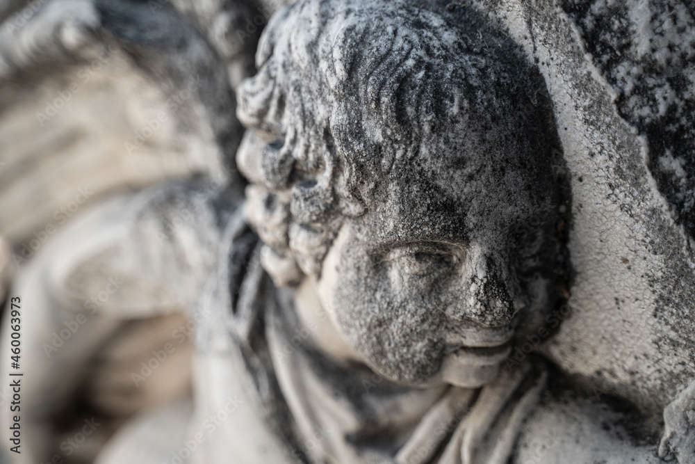 ancient stone basorelief of child head ancient stone basorelief of child head